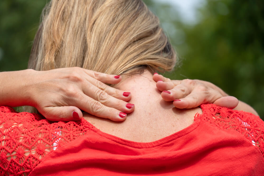 What are the symptoms of a herniated disc in the neck? shutterstock 1512057608 herniated disc in neck