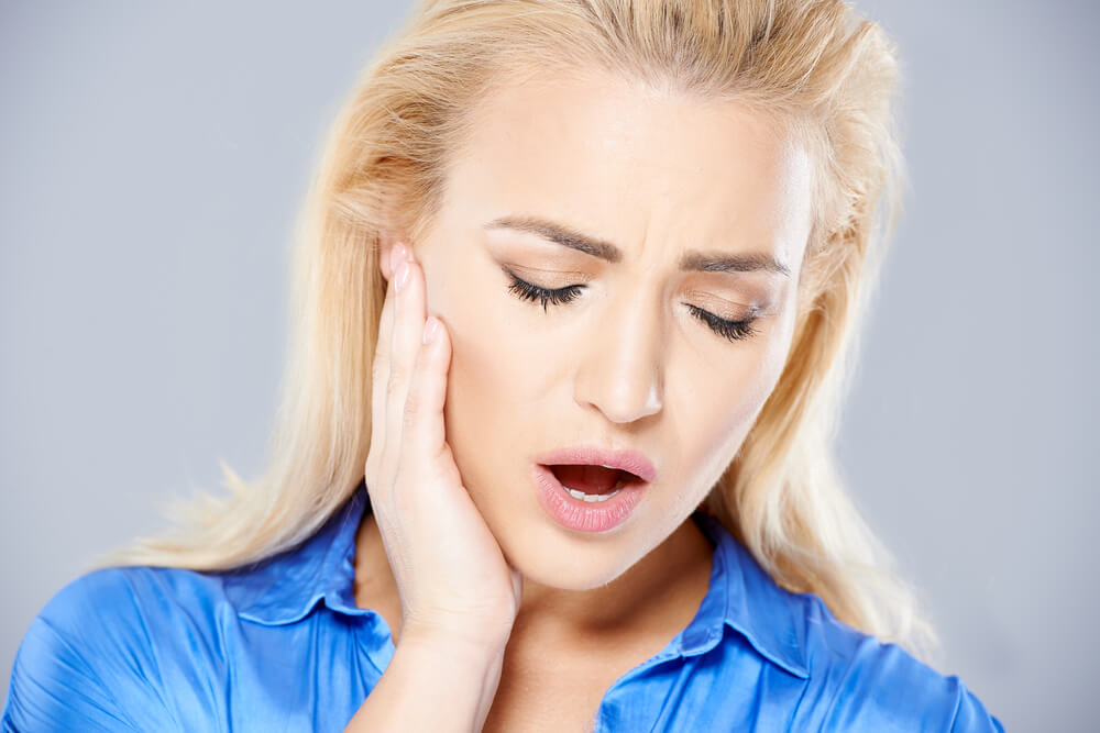 ear hurts when i bite down (tmj dysfunction)