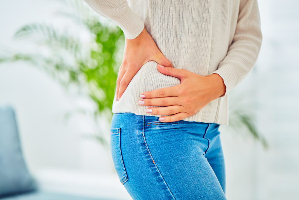 What conditions could be causing dull pain in my hip?