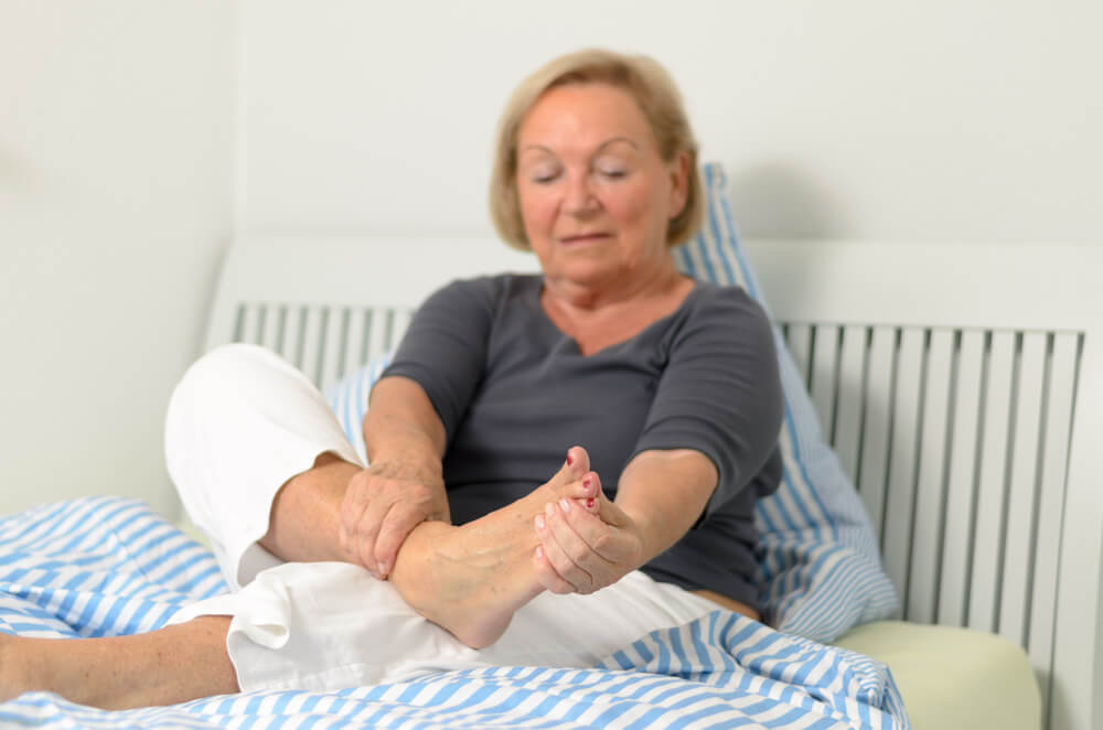 What causes a stabbing pain in the side of my foot? shutterstock 295621037 stabbing pain in foot side