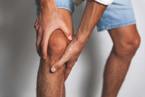 Should I be concerned about a loud pop in the knee followed by pain?