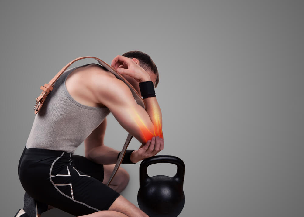 Elbow pain when lifting? Here's what you should do shutterstock 1651894921 elbow pain when lifting