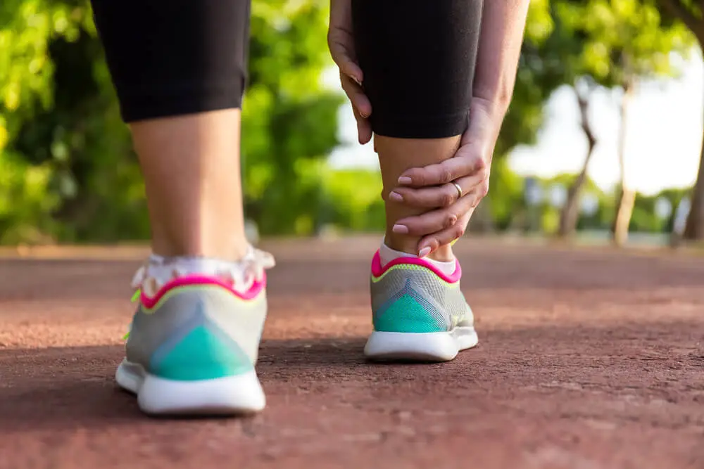 Why do I have ankle pain from running? shutterstock 428463574 5 causes of ankle pain from running | continuum wellness