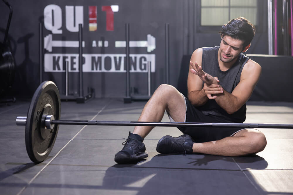 why does my wrist hurt when benching