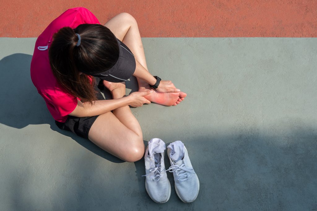 what causes pain on the top of my foot? border